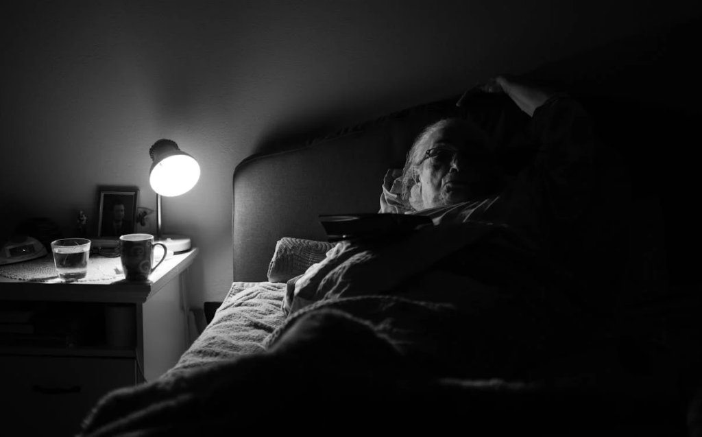 Elderly woman in bed