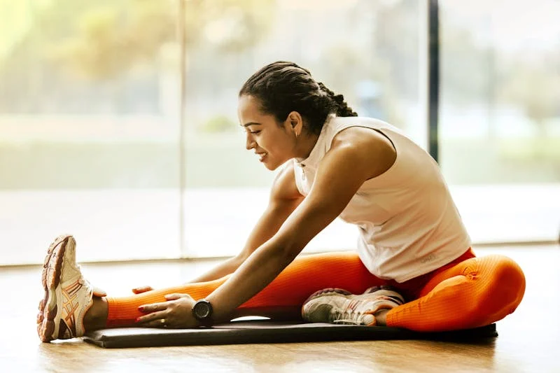 woman stretching her leg