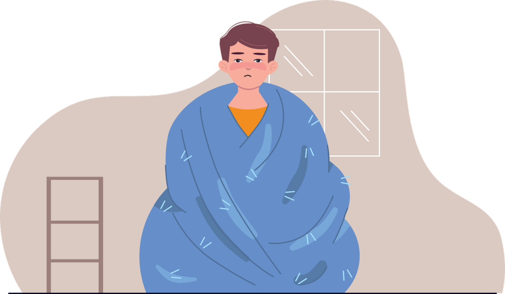 person in a blanket with a fever
