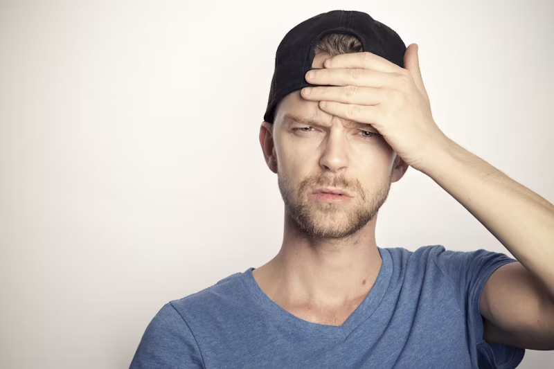 a man with a headache