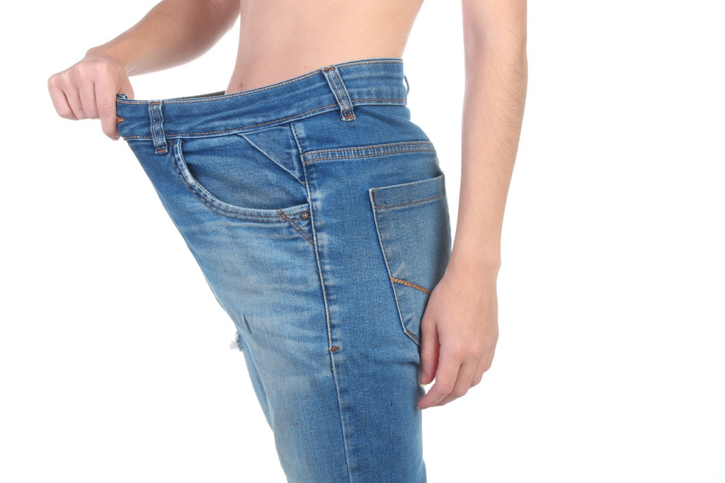 a person experiencing weight fluctuation