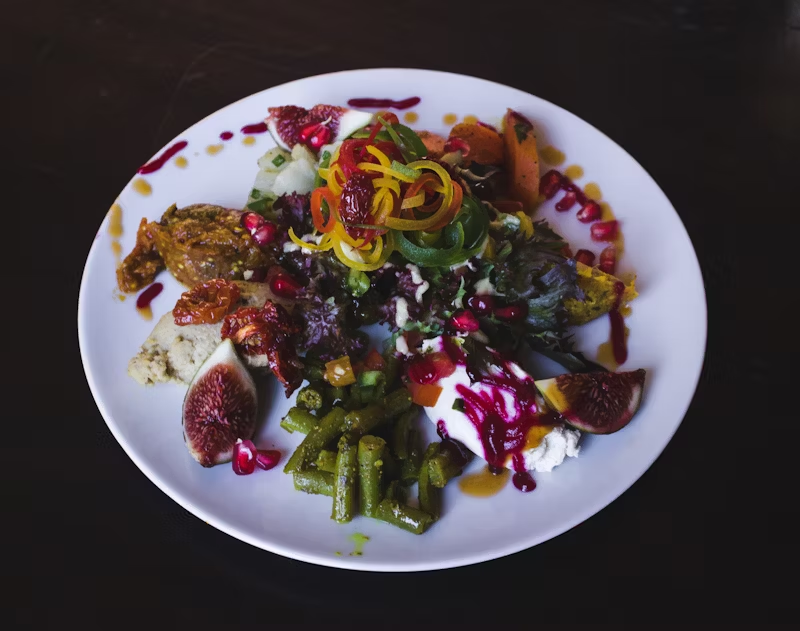 a colorful variety of foods on a plate
