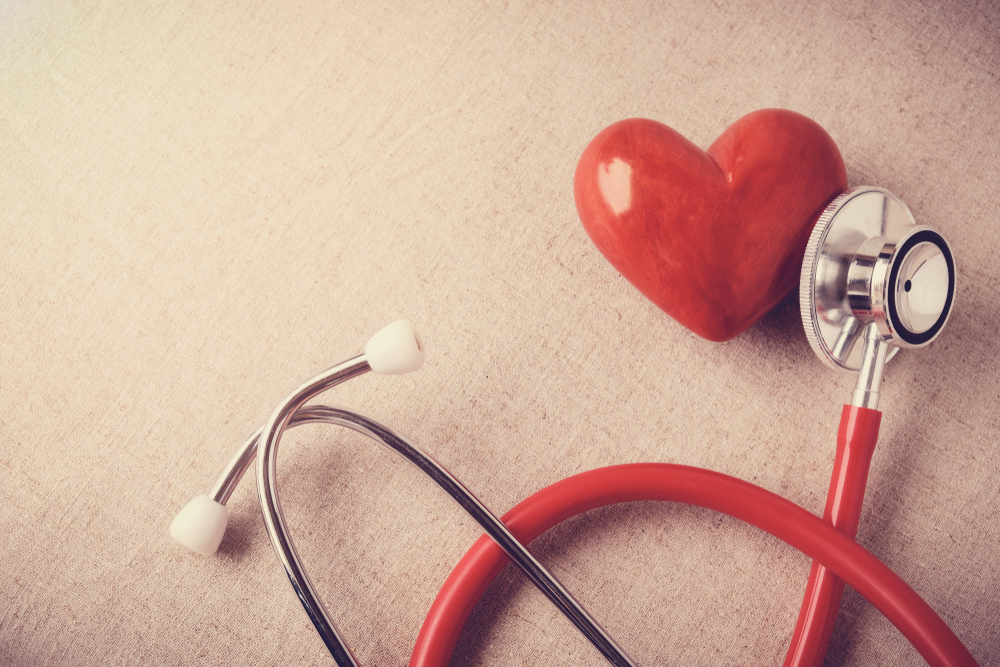 red heart with stethoscope, heart health,  health insurance concept, world health day, doctor day, world hypertension day
