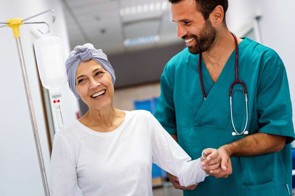 Woman with cancer during chemotherapy recovering from illness in hospital