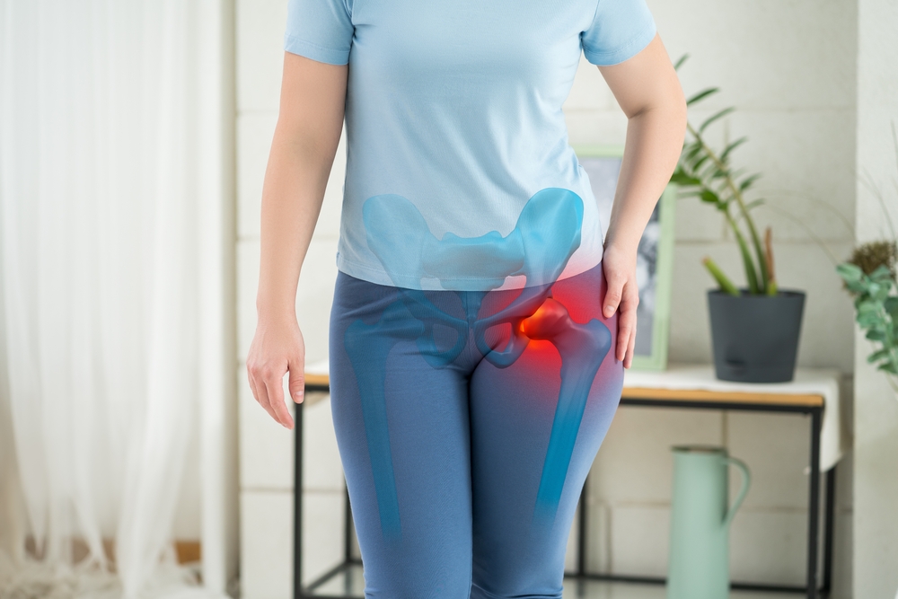 Hip joint pain, woman suffering from osteoarthritis at home, health problems concept, BeH3althy