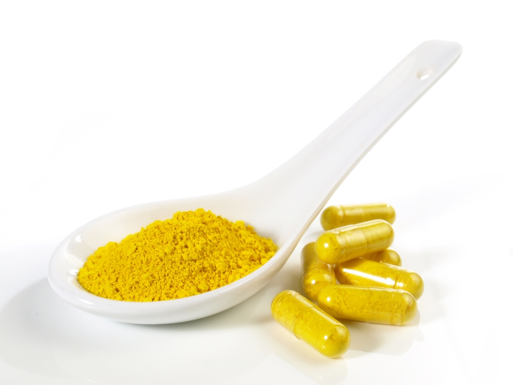 Berberin Powder and Pills isolated on white Background