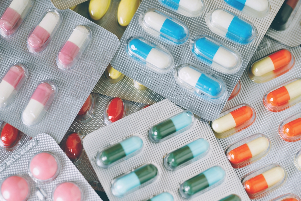 close up pharmaceuticals antibiotics pills medicine in blister packs. colorful antibacterials pills Pharmacy background. capsule pill medicine Antimicrobial drug resistance. Pharmaceutical industry