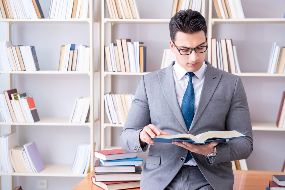 Business law student working studying in the library