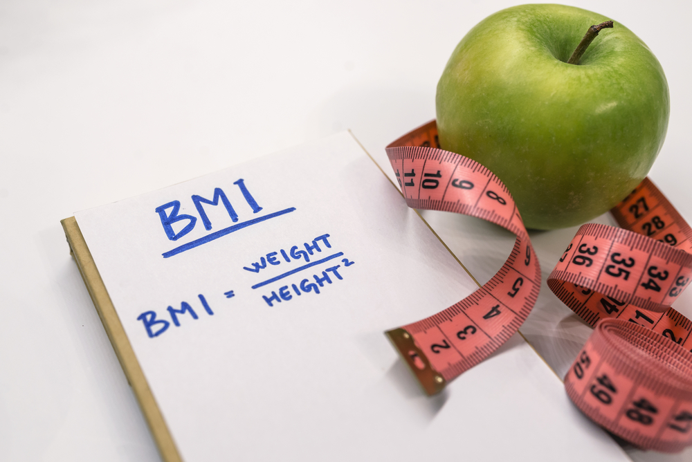 BMI calculation, apple and measurment tape
