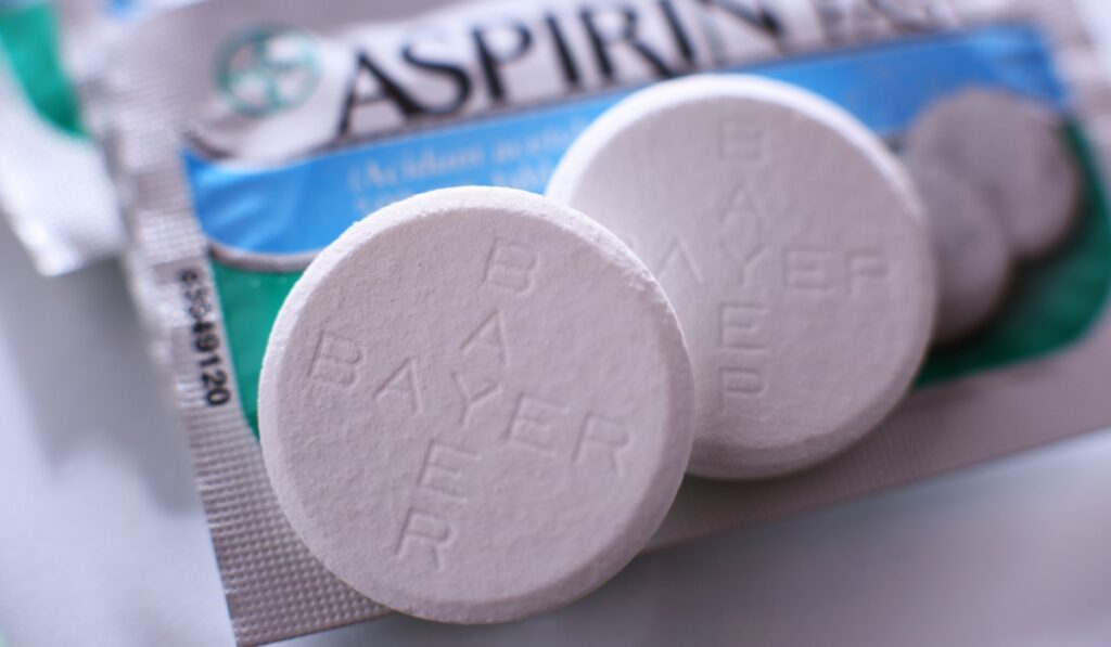 Aspirin pills, a brand of popular medication, the first and best-known product of Bayer, German multinational pharmaceutical company headquartered in Leverkusen