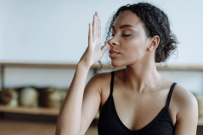 woman breathing in through her nose