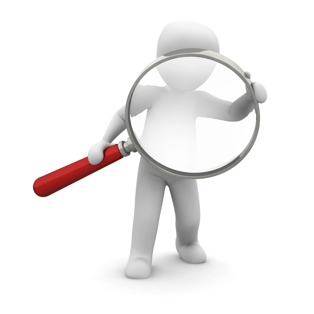 stick figure holding magnifying glass