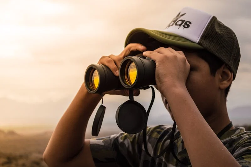 Man using binoculars