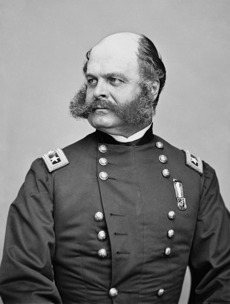 mustached bald man