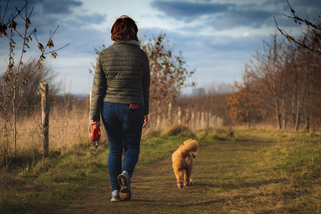 woman walking with dog