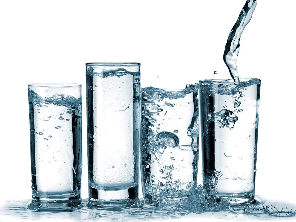 Water flow in four glasses