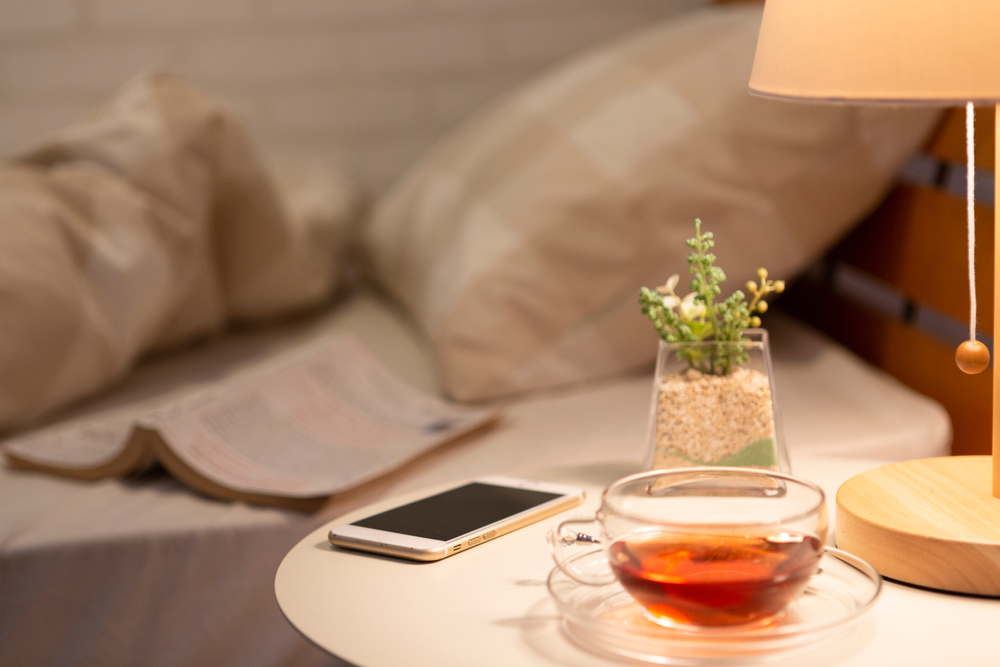 Herbal tea and smartphone on the table