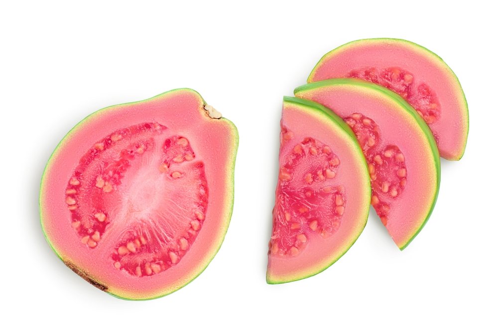 Guava fruit slices isolated on white background with clipping path and full depth of field. Top view. Flat lay