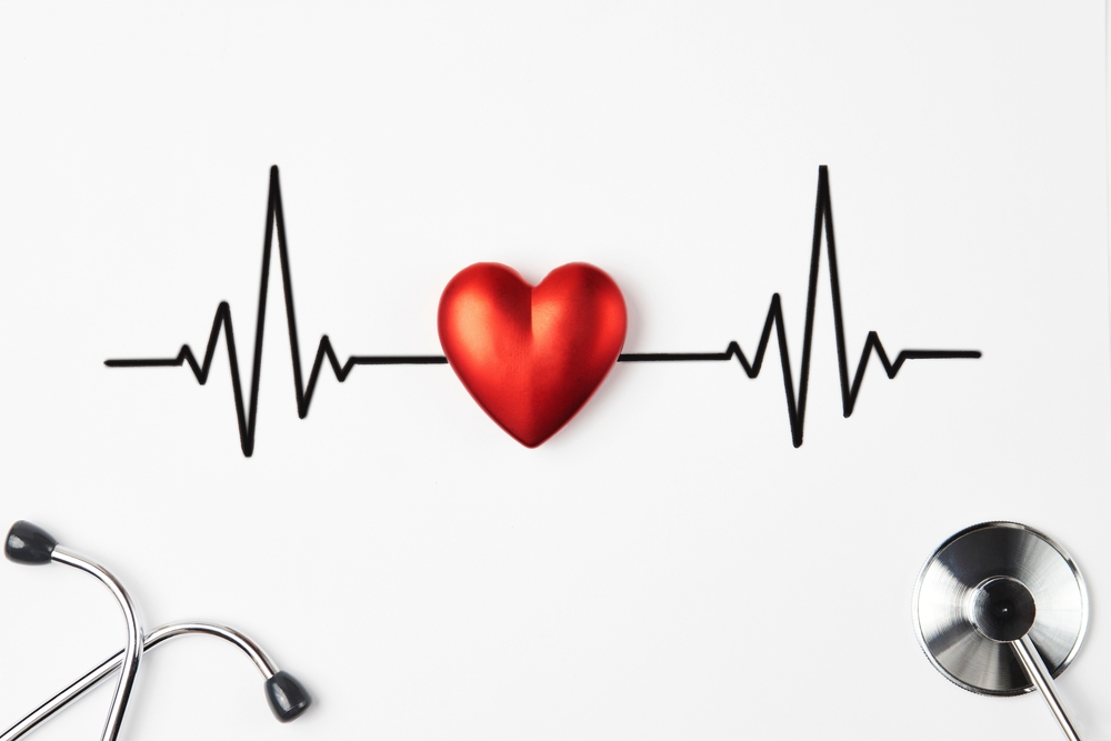 Heart and Heartbeat on a white background with copy space. Stethoscope heart cardiogram. Pulse beat measure. Medical healthcare concept