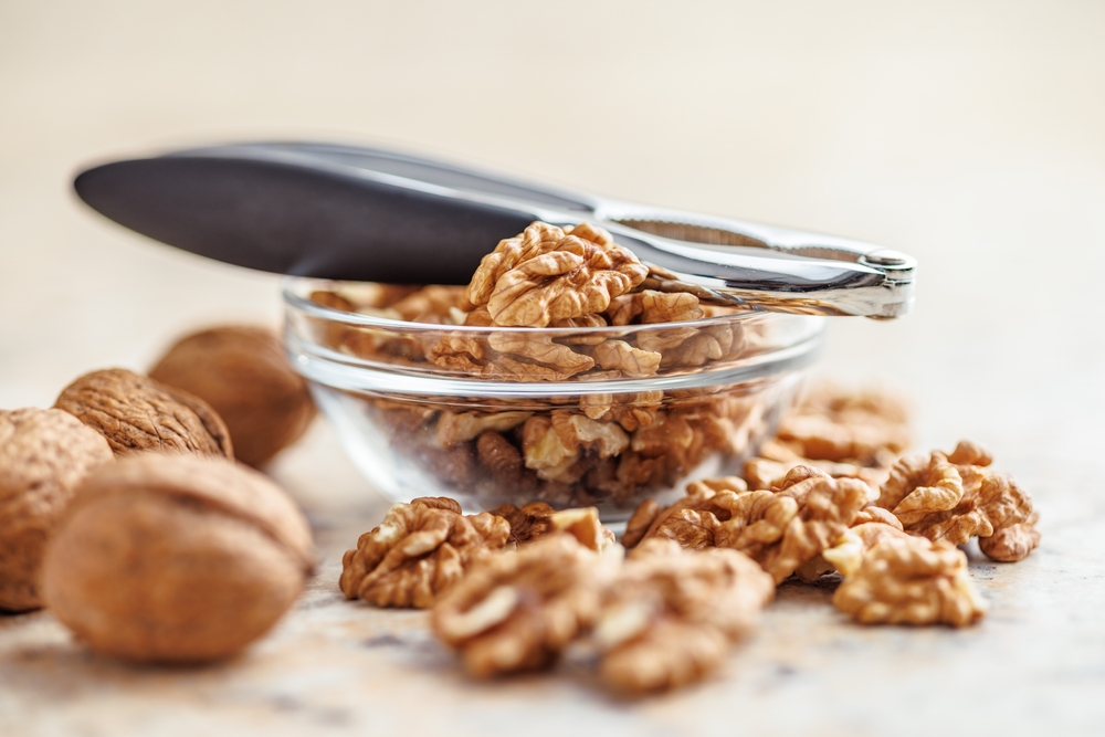 Peeled dried walnut kernels in the bowl.