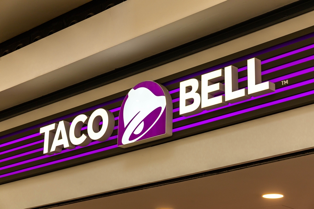 Lisbon, Portugal. 11 December 2023. Taco Bell logo sign at the restaurant. Taco Bell is an American fast food chain.