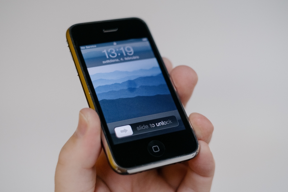 RIGA, LATVIA, JANUARY 2024 - An old Apple iPhone 3G smartphone is displayed for editorial purposes