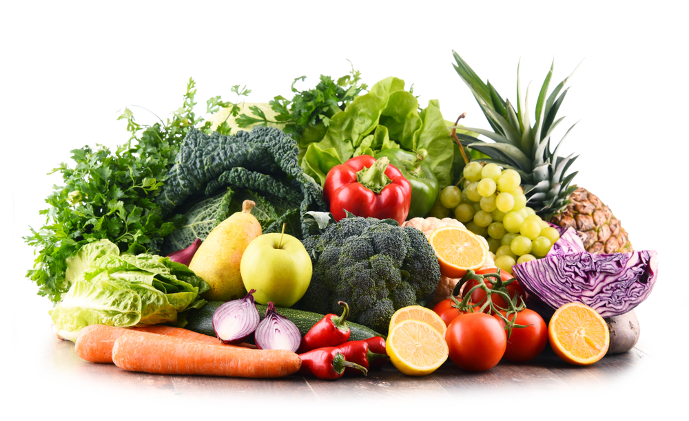 Composition with variety of raw organic vegetables and fruits. Balanced diet