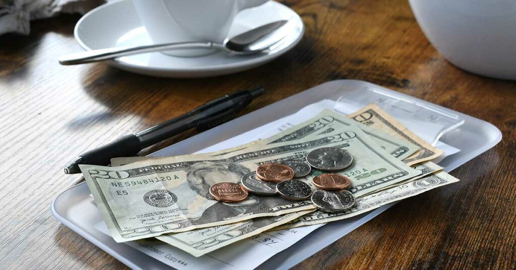 From Your Hair Dresser to a Barista, Here’s How Much You Should Tip in Every Situation - Featured image