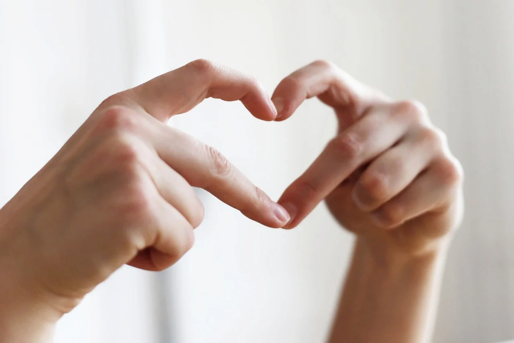 fingers making a heart