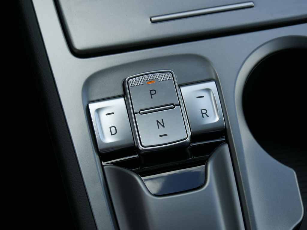 Parking button in a vehicle