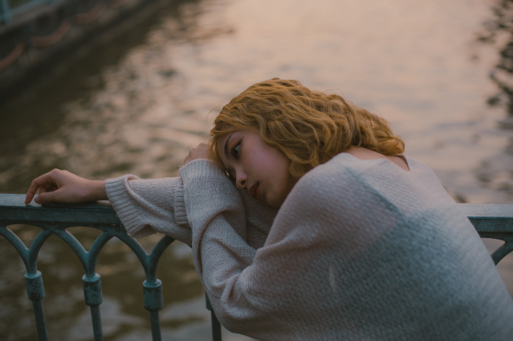 woman stressed on a railing