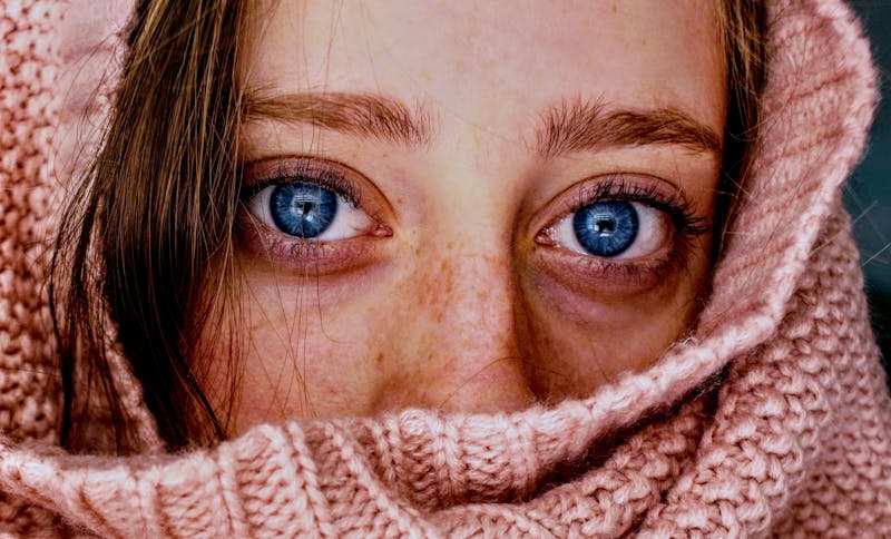 woman in a sweater with blue eyes
