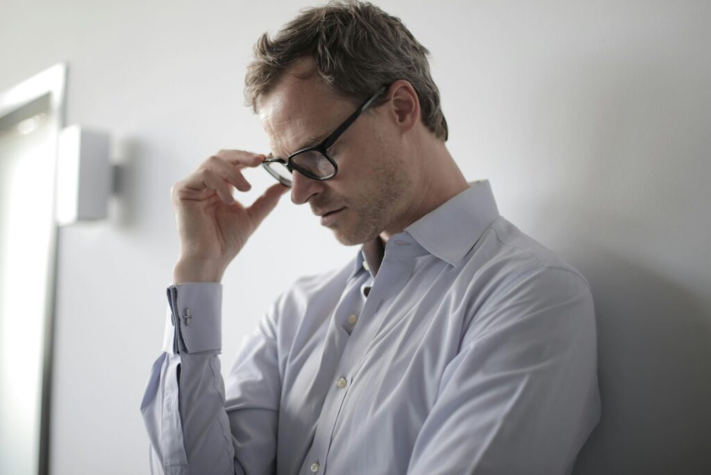 Man holding glasses 