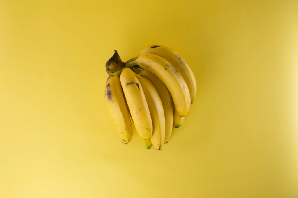bananas on yellow background