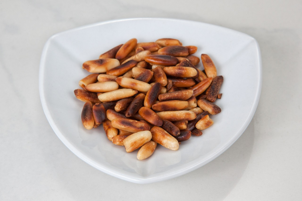 charred pine nuts