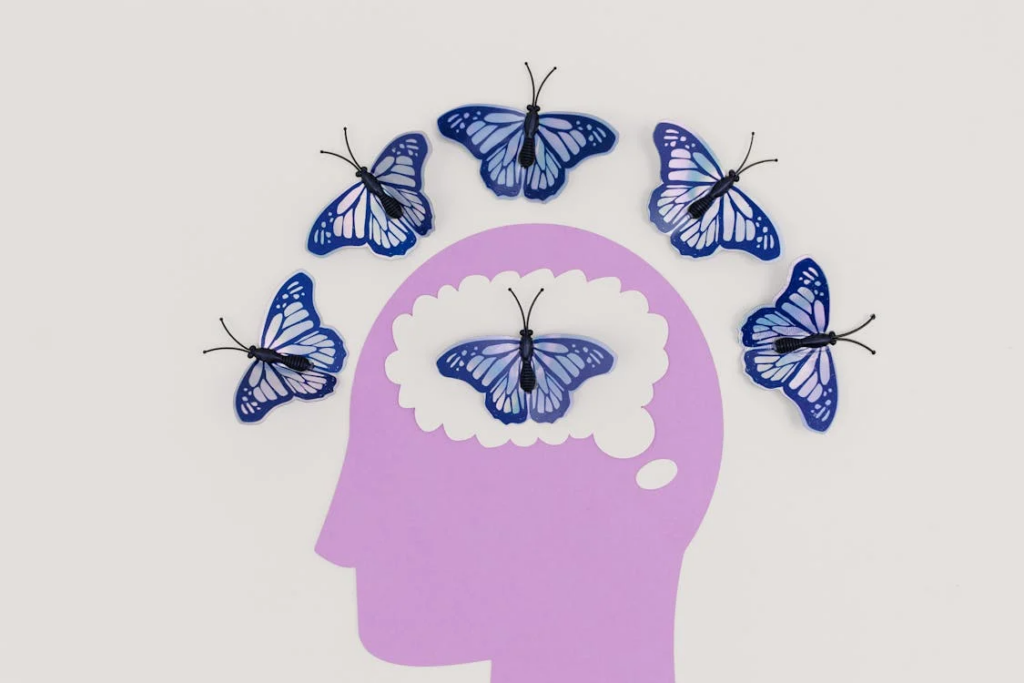 human head with butterflies