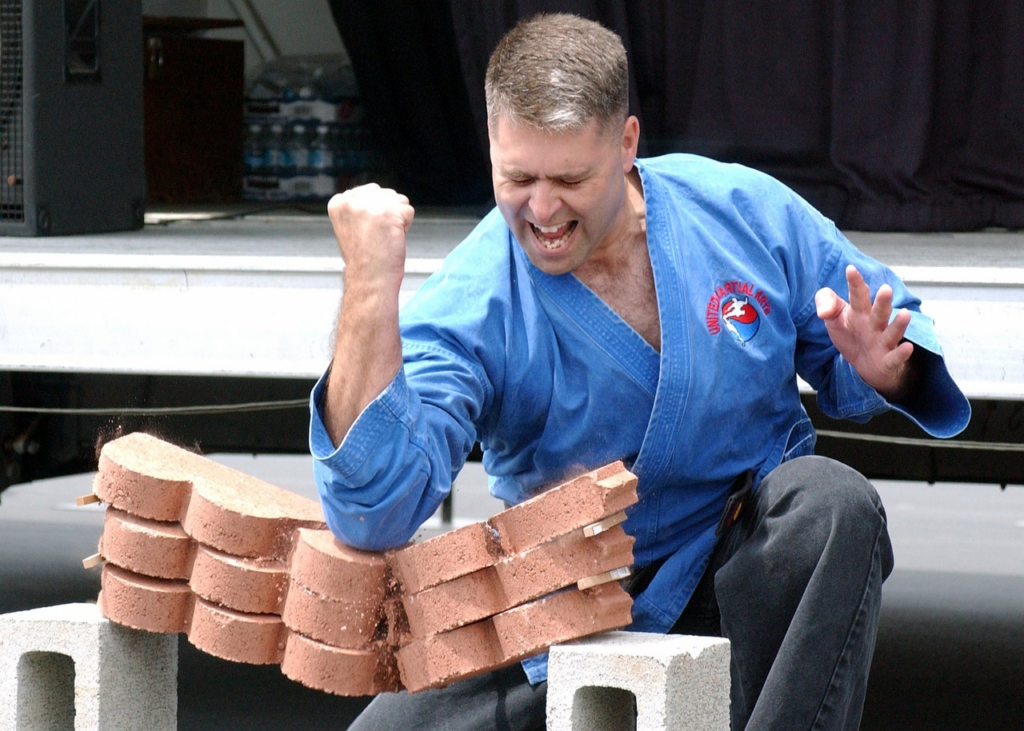 elbow strike on a bunch of bricks