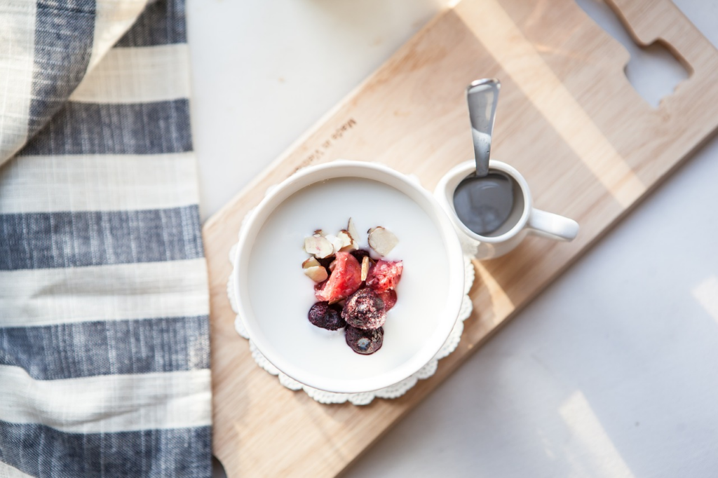 yogurt with fruit and nuts in it