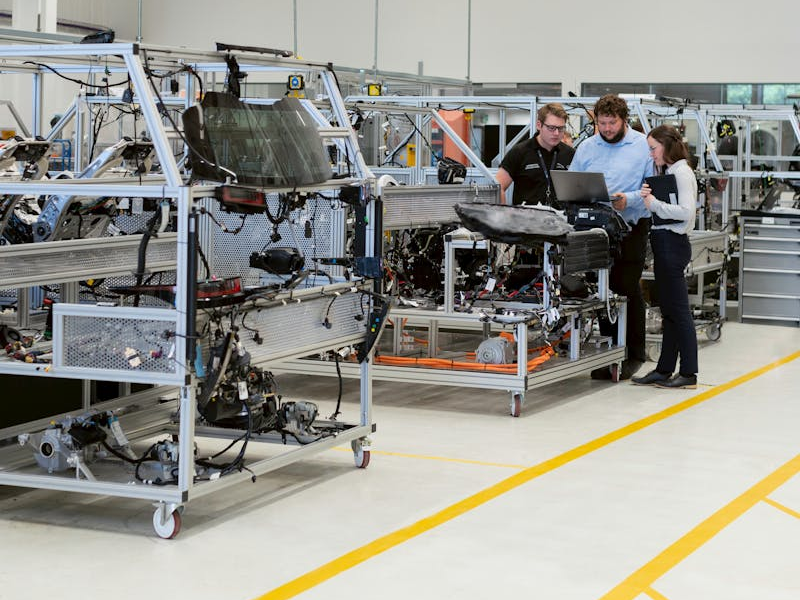 auto factory workers working