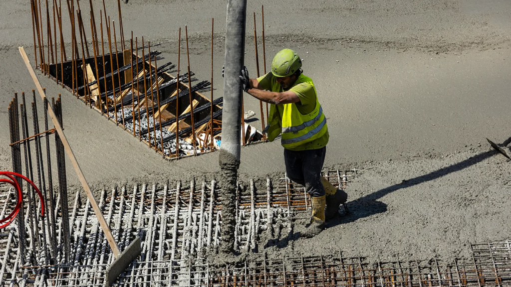 adding cement to a structure during construction