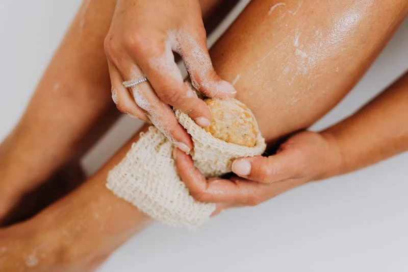 close-up of leg being exfoliated