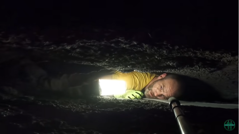 man stuck in cave