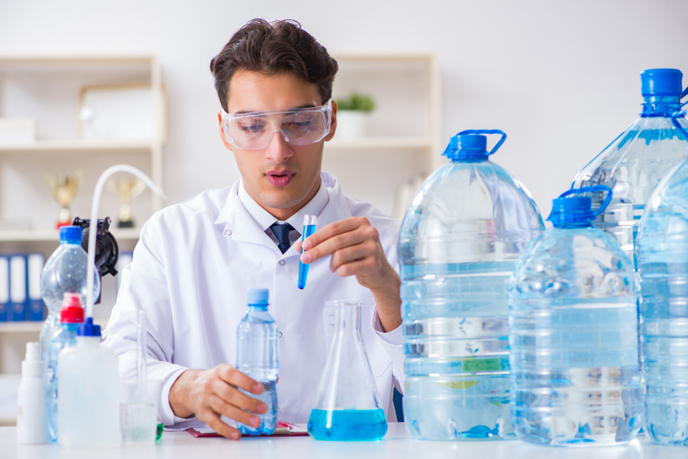 Lab assistant testing water quality