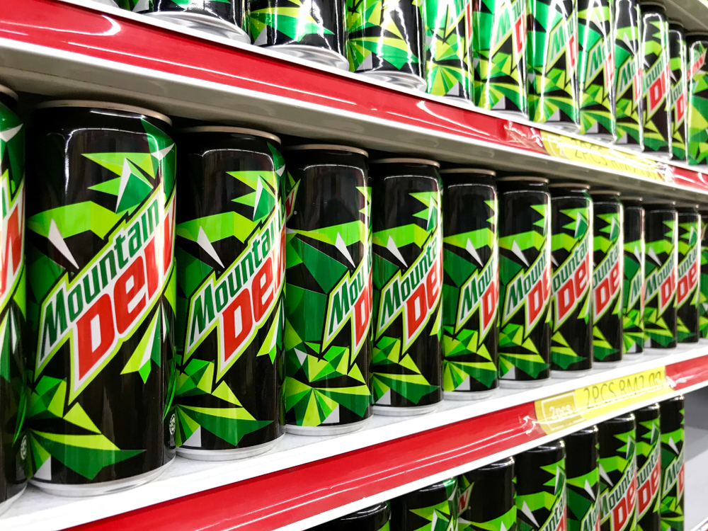 Kuala Lumpur, Malaysia - July 10 2018: Mountain Dew drinks branded display for sell in the supermarket shelves.