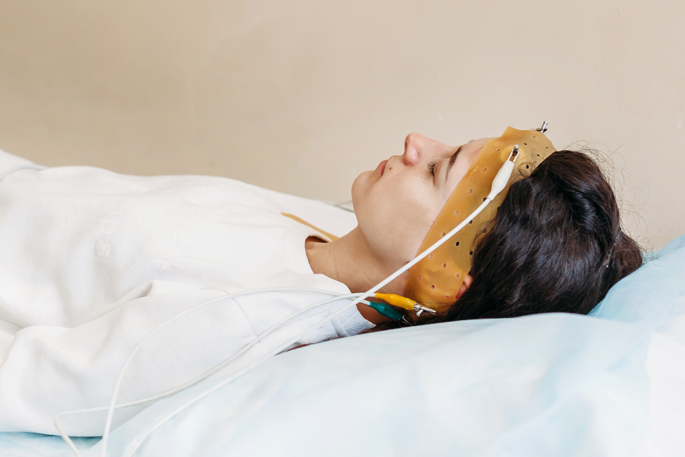 patient with encephalography electrode. medical examination Electroencephalogram studying the vascular system of the brain (EEG) Rheoencephalography