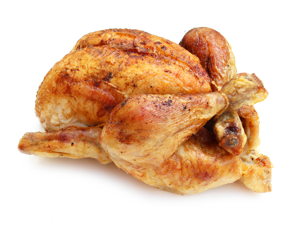 Grilled whole chicken isolated on white background
