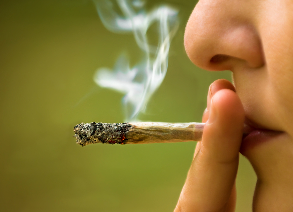 girl smoking marijuana close up