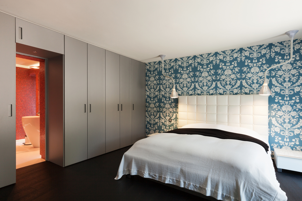 interior of a modern villa, beautiful bedroom with double bed
