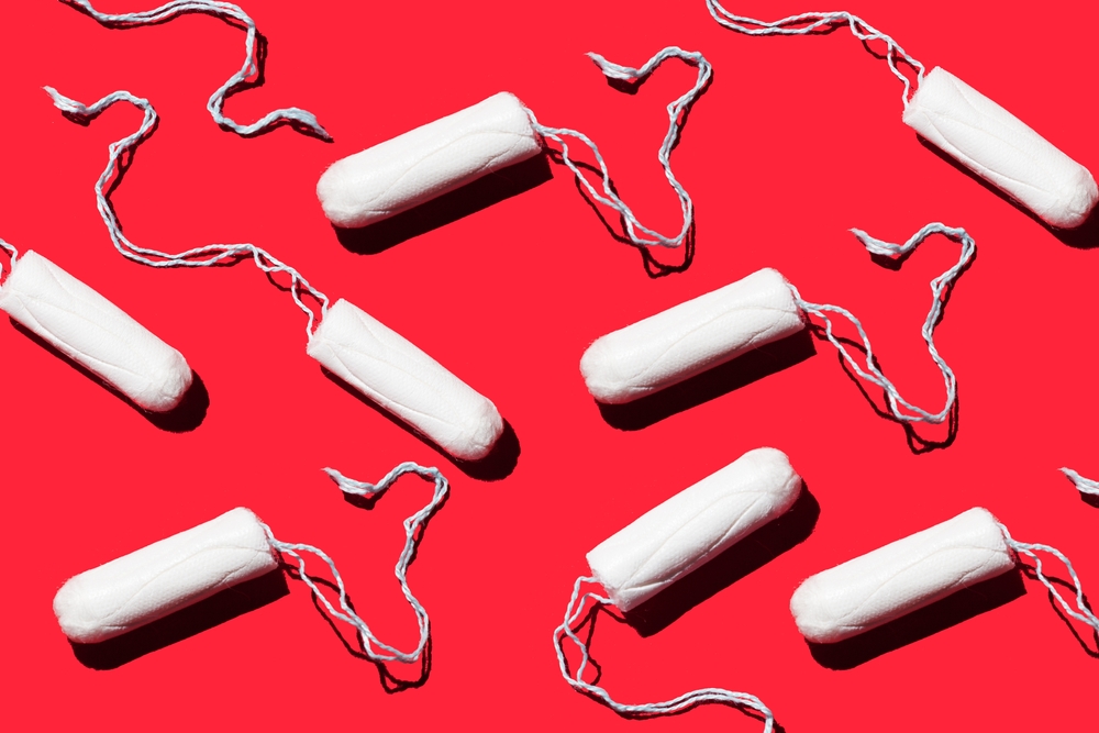feminine hygiene tampons on a red background. Menstruation concept
