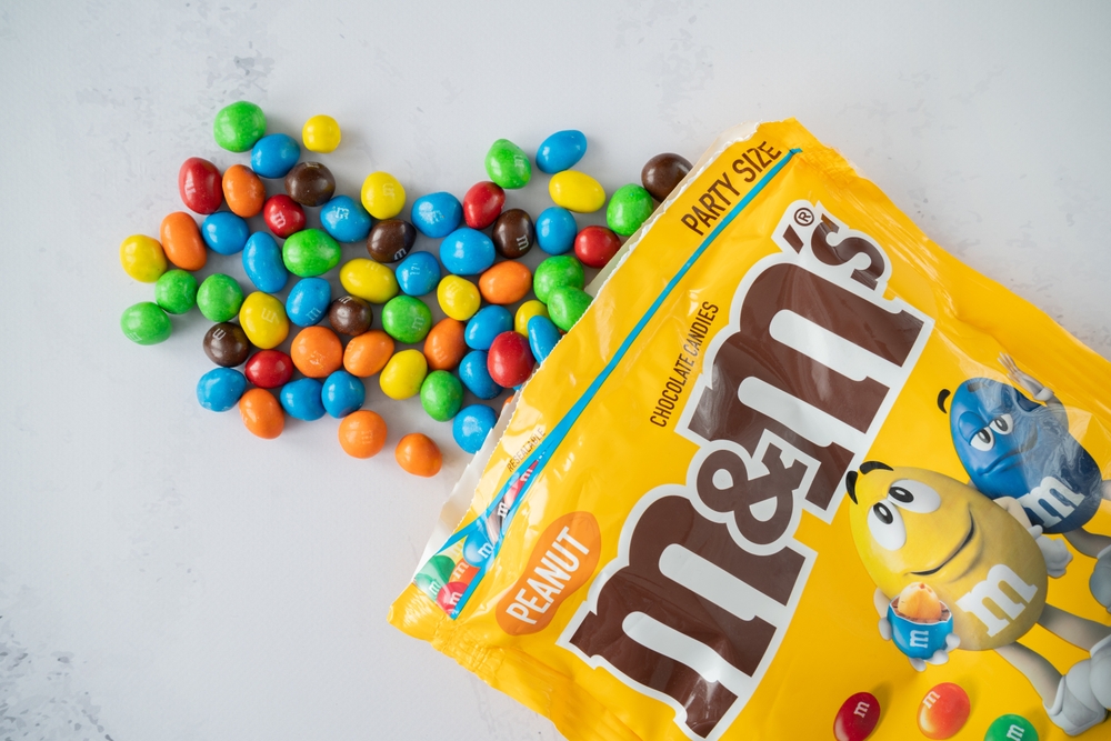 KRAKOW, POLAND - APRIL 24, 2023: M and Ms colorful button-shaped chocolate candies.